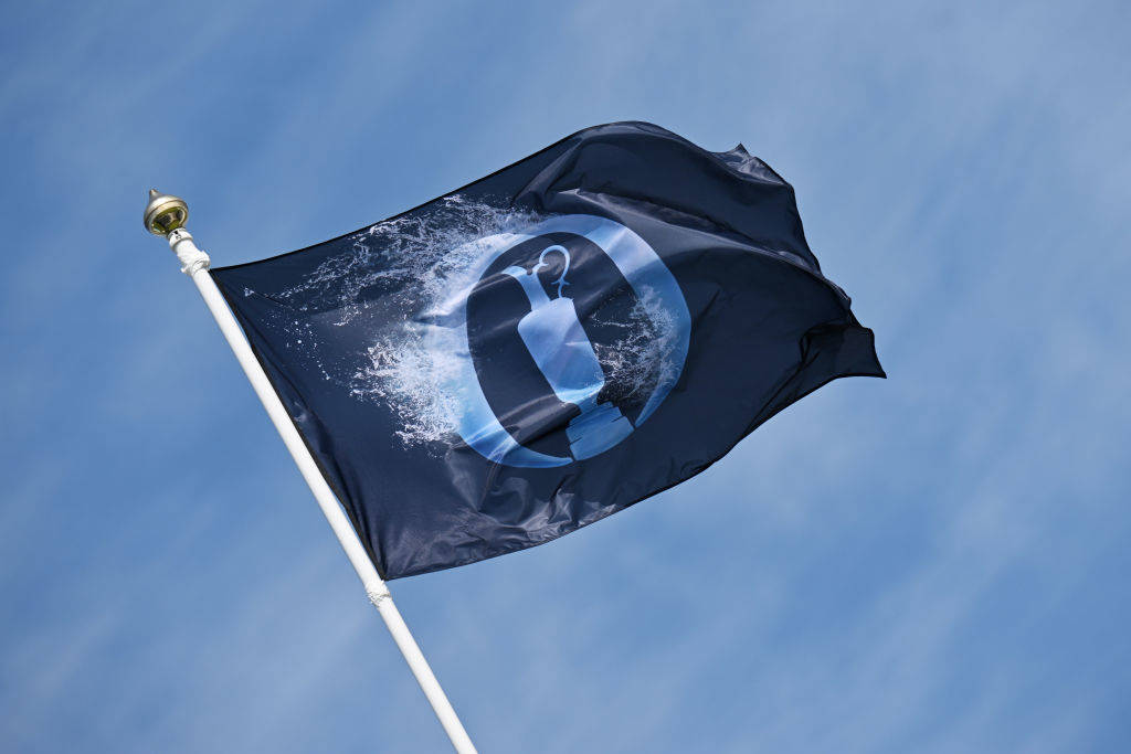 The Open flag blows in the wind at Hoylake